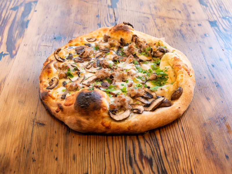 sausage and mushroom pizza from Ada's