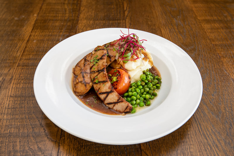 detailed image of the Bangers + Mash dish from RiRa