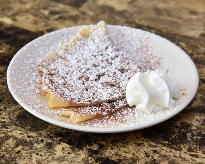 crepe with powder sugar from Sip of Europe